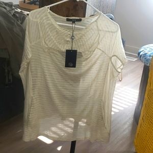 CREAM with faded or distressed black stripes, size small